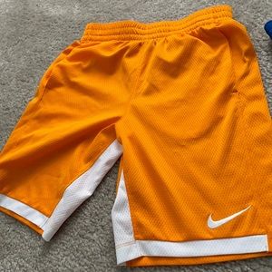 3 Nike shorts, 1 T-shirt